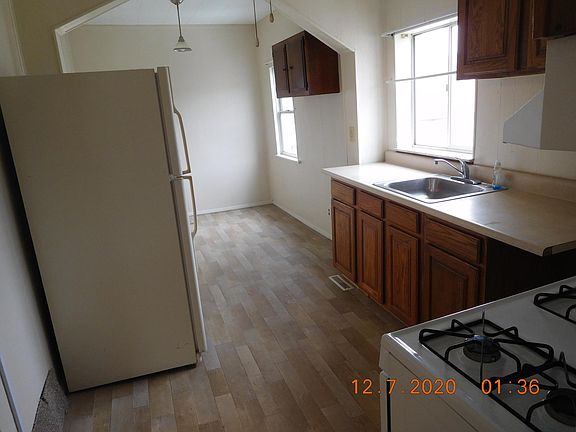 Gas stove and refrigerator included.