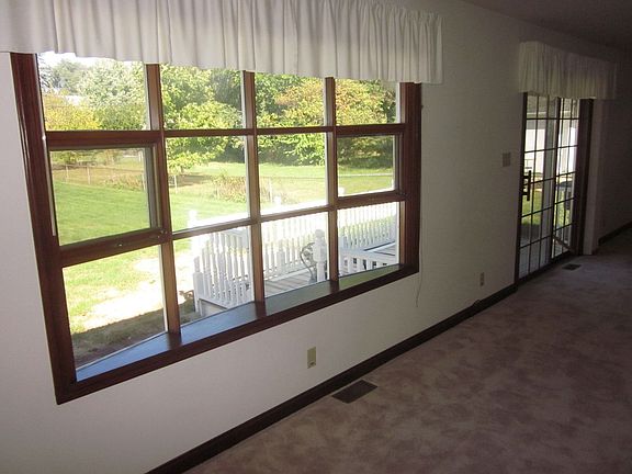 Wood bayed window and slider in the family room addition