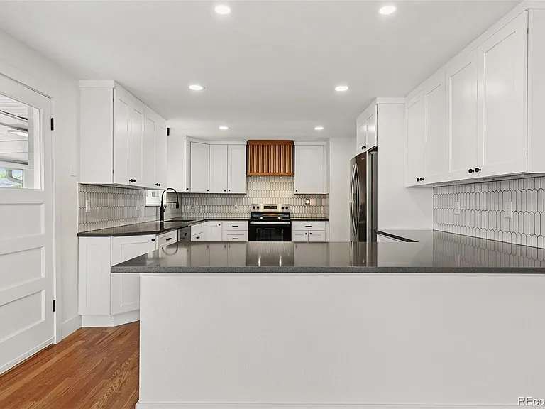 6745 Garrison St — Photo 9