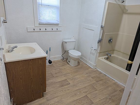 Roomy bathroom includes tub