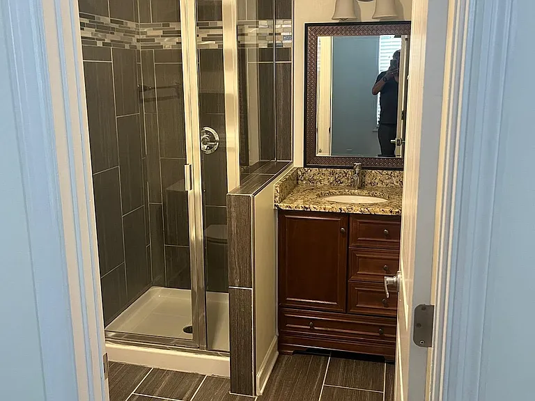 Master Bathroom with beautiful Tiles and Standing Shower