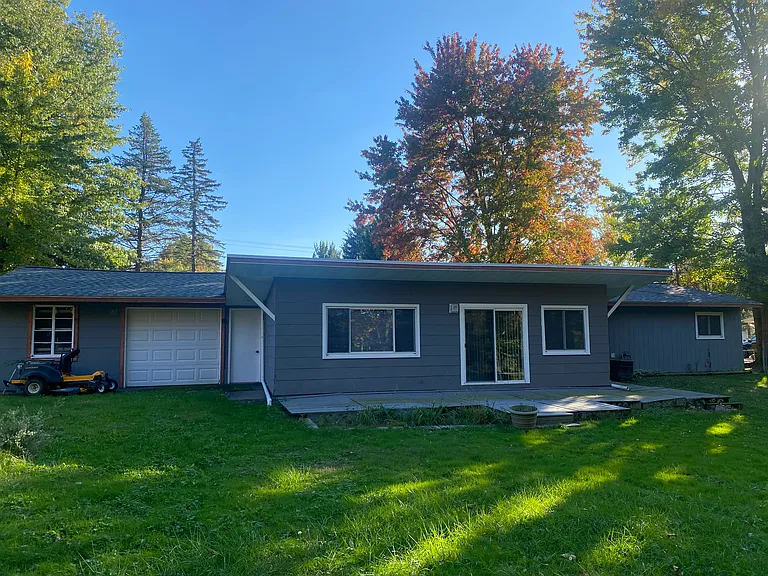 Back of the house emphasizes large garage door to the backyard