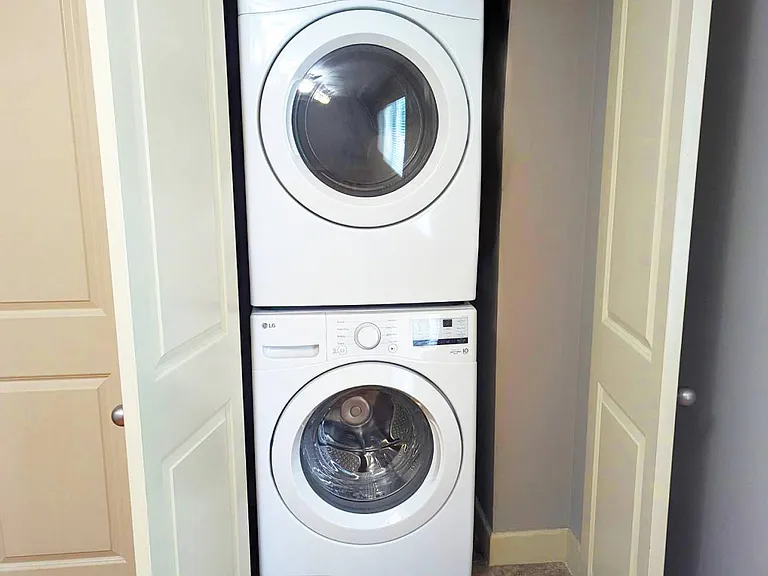 In-unit washer and dryer at Auburn Apartments.