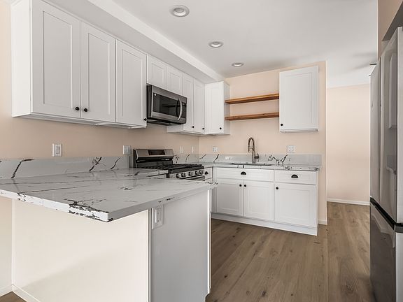 kitchen with all new appliances. Refrigerator, stove, oven, microwave