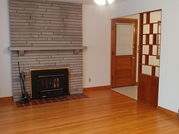 Family Room - Wood Burning Fireplace Insert - Back Door