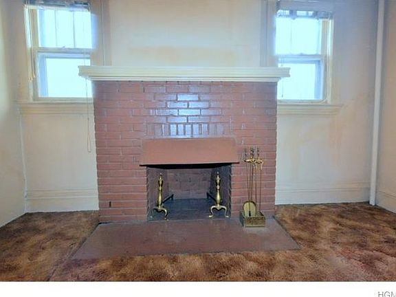 Spacious Eat-in-Kitchen with door leading to back patio and yard.
