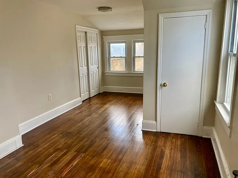 (second floor) left side bedroom with 2 full closets, hardwood floors