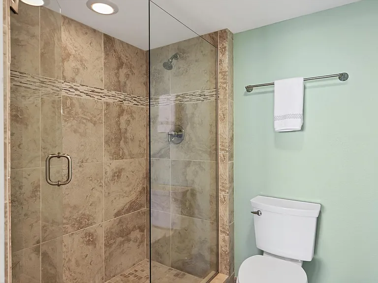 Separate shower/toilet room in primary suite