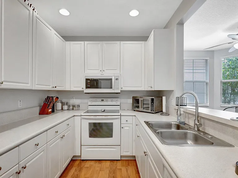 4320 Blowing Point Pl — Photo 15
