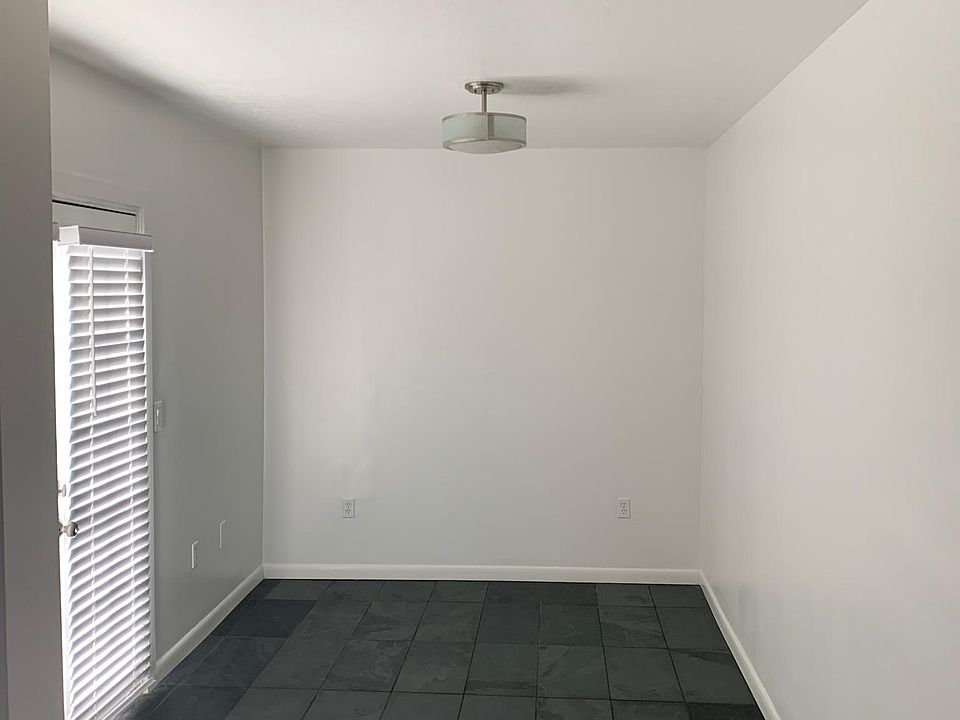 Extra room off the kitchen can be used as an office/sunroom