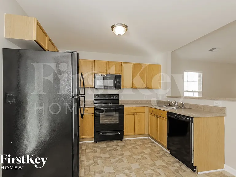 5716 Henderson Oaks Dr — Photo 7