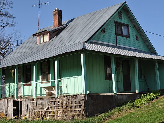 Deck wraps 3/4 of the house