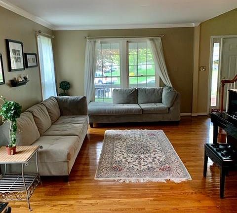 Formal living room with open sight lines to the formal dining room