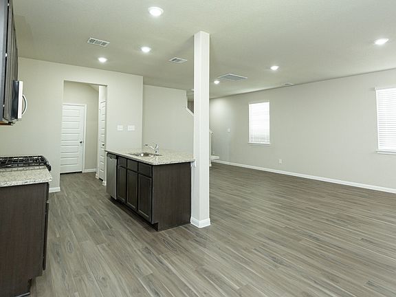 Dining Area to Kitchen and Family Room