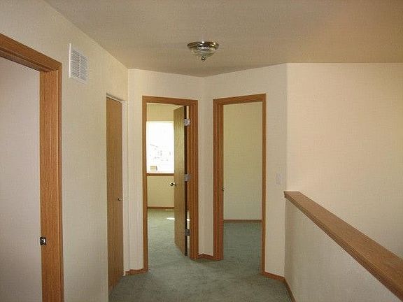 wide hallway to 3 bdrms