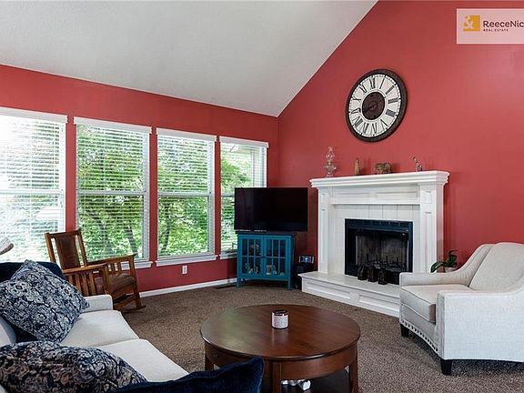 Bright and cheery living room offers so much natural light!