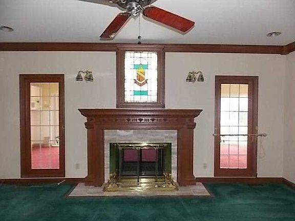 Great Room. Closer and more detailed view of double sided fireplace.