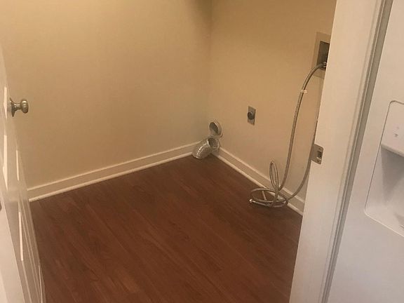 Separate laundry room with hookups for full-sized electric w