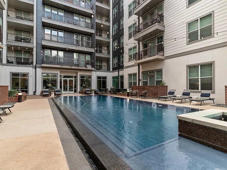 Lounge by the pool area complete with fireplace and seating areas