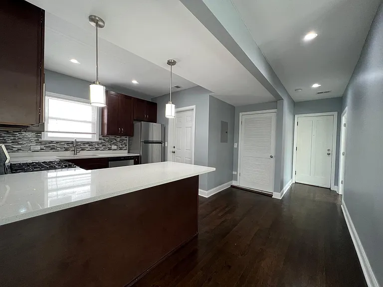 Foyer area (view from the kitchen hallway)