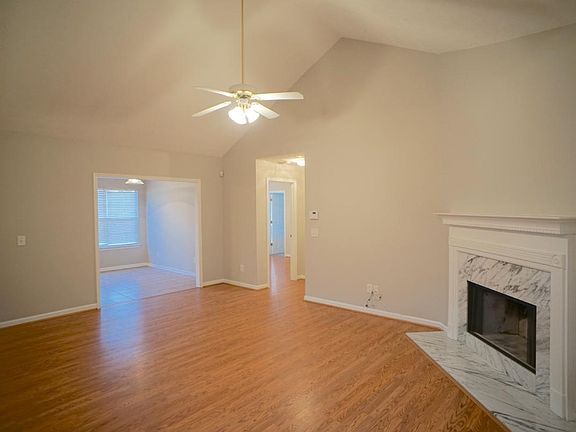 Living room with vaulted ceilings