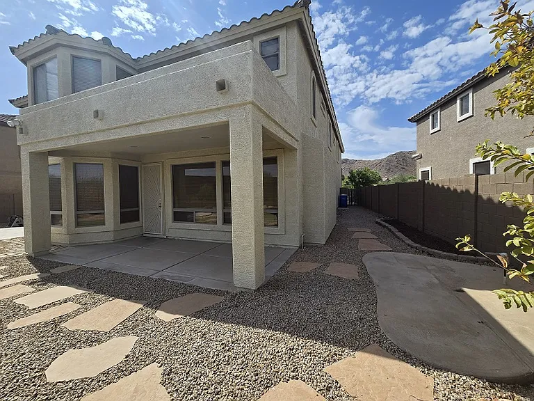 Backyard walkway to front
