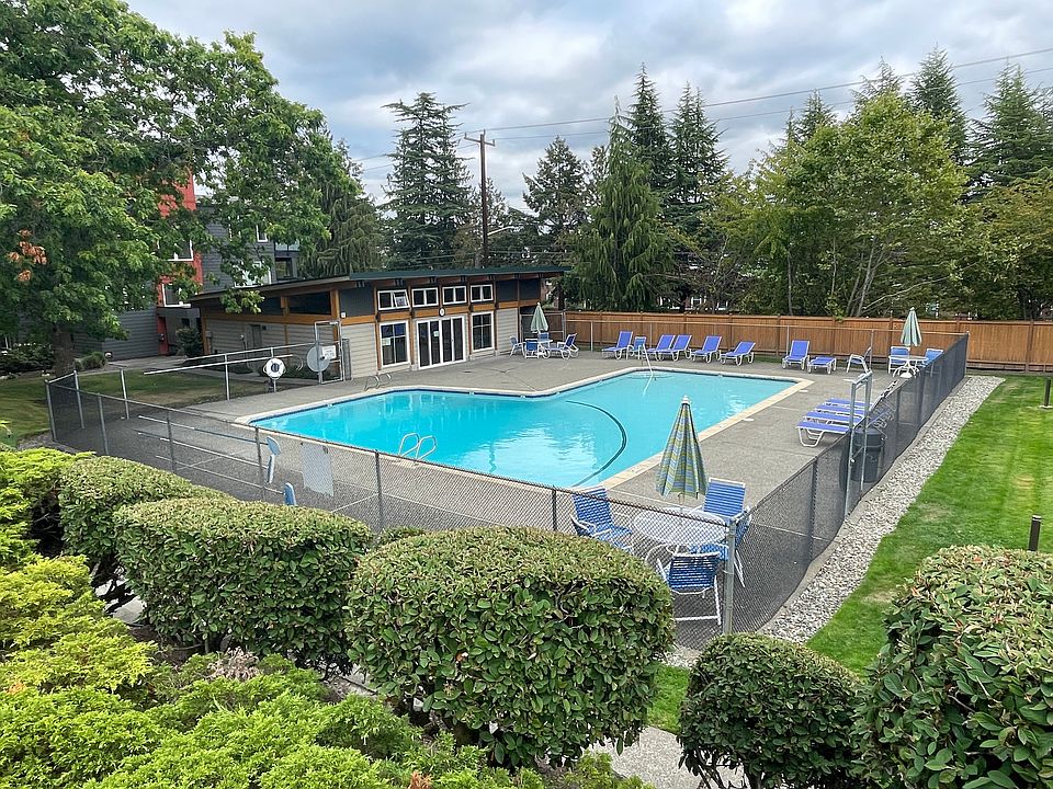 view of swimming pool and cabana