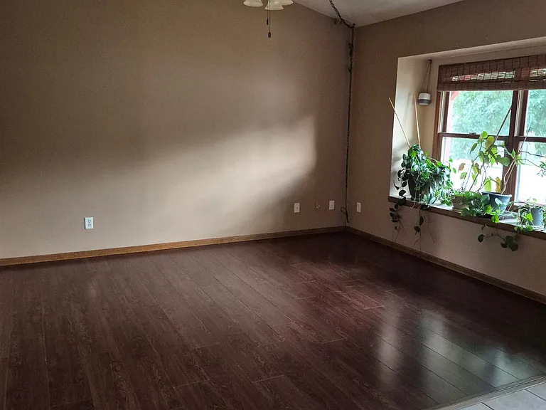 Main level living space, shown empty