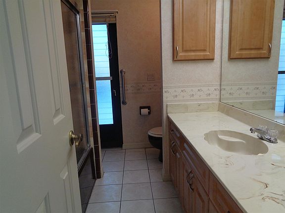 Guest Bathroom Leads to Pool