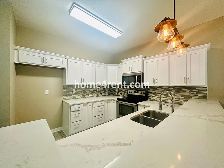 12701 E 47th Terrace Ct S — Photo 9