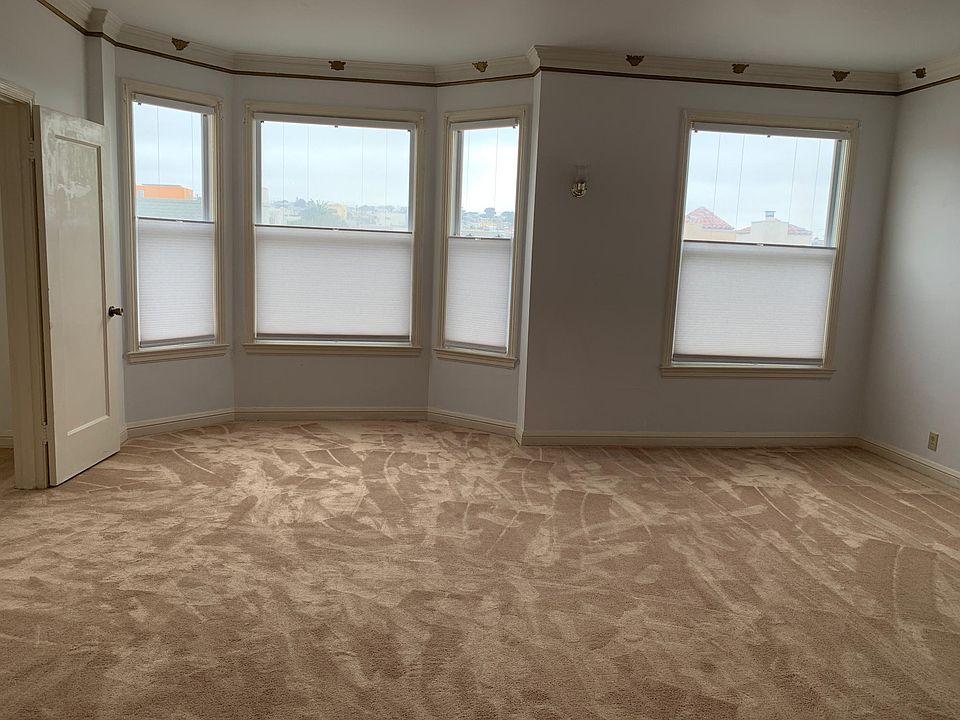 spacious living room with plenty of natural light