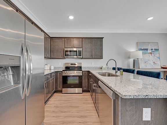 Pendant lighting/cabinet lighting and backsplash not showing.