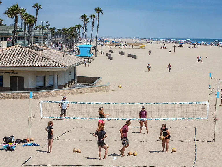 Catch a game of beach volleyball