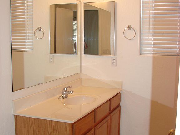 Master bath has a tube shower combo.