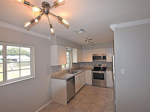 4th image of 32702 Blossom Ln