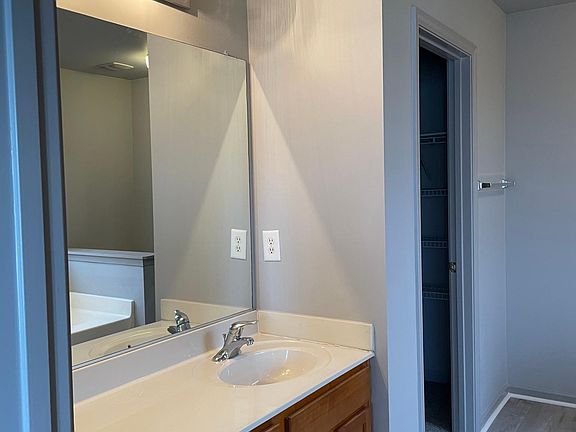 Master's bath; door to walk-in closet