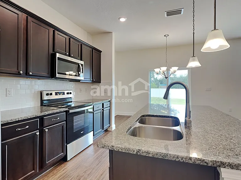 6609 Hidden Rose Pl — Photo 3