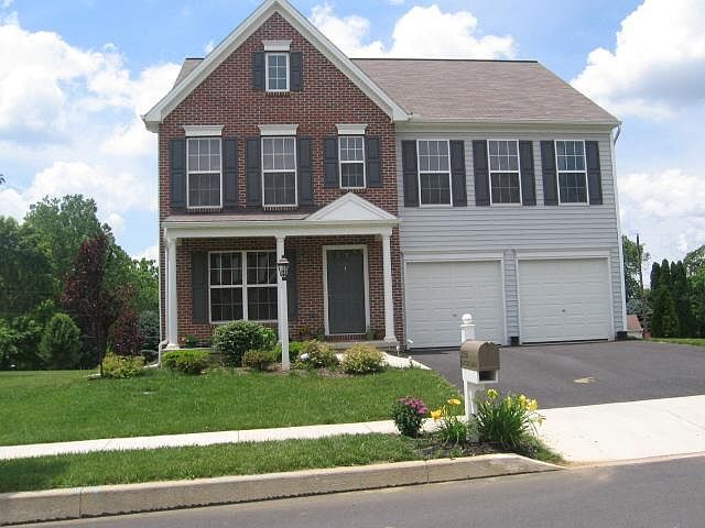 Large front portico to relax!