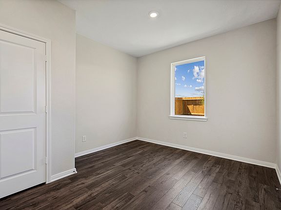 The dining room leads to the back yard.