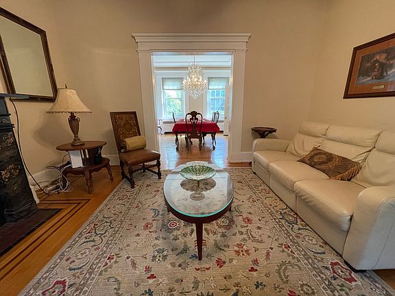 Fabulous Living Room with Leather Reclining Sofa and matching Love Seat. This room has great flow into the Dining Room.