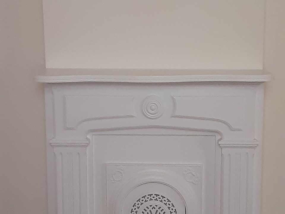 Decorative mantel in second parlor