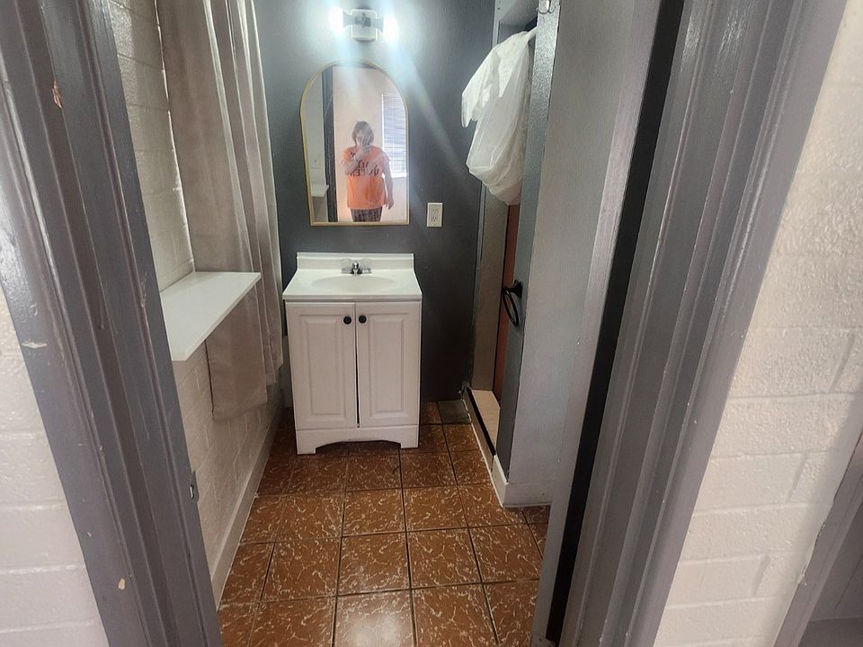 Bathroom with shower. No tub.