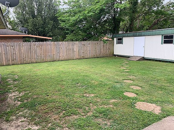 Back yard with large storage