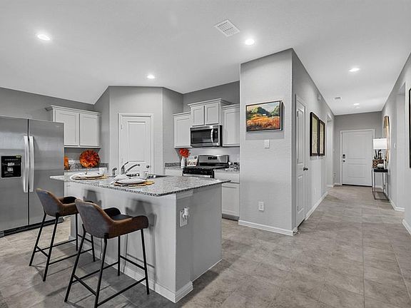 Kitchen - All Home and community information, including pricing, included features, terms, availability and amenities, are subject to change at any time without notice or obligation. All Drawings, pictures, photographs, video, square footages, floor plans, elevations, features, colors and sizes are approximate for illustration purposes only and will vary from the homes as built.