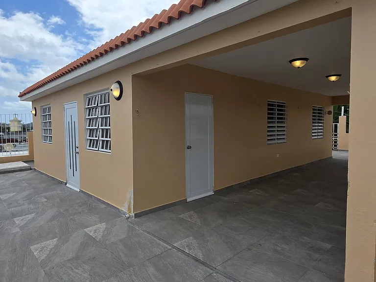 Ample outdoor terrace with plenty of space for entertaining al fresco. The patio contains both covered and uncovered portions. Enjoy the outdoors rain or shine.