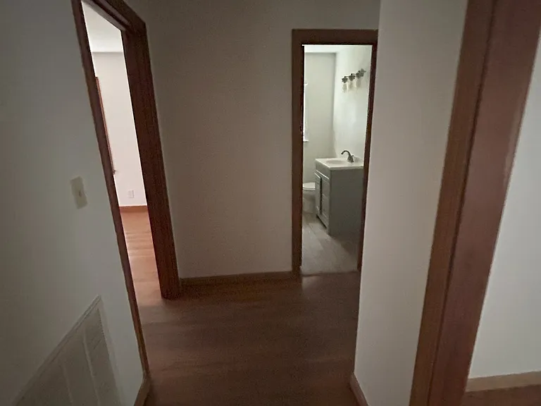 Hallway to bedrooms and bathroom