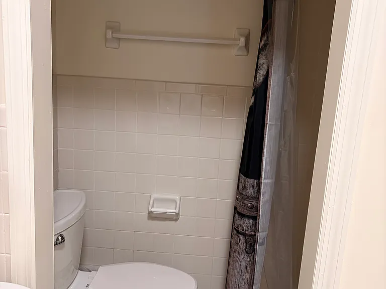 Bathroom 1 with connect laundry with washer and dryer in new condition.