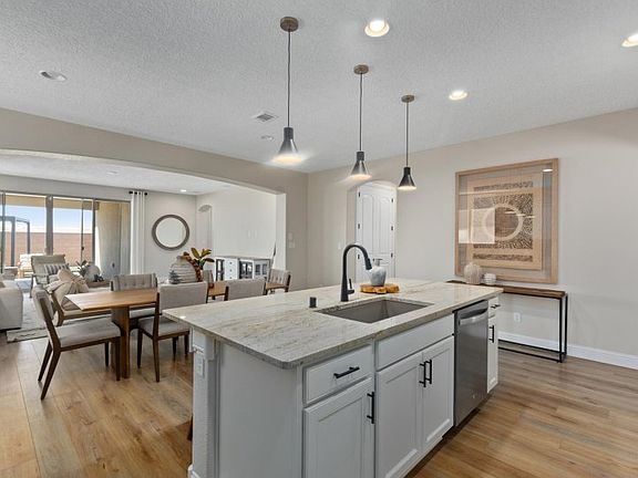 Cleanup after meals is a breeze with the island sink and dishwasher.