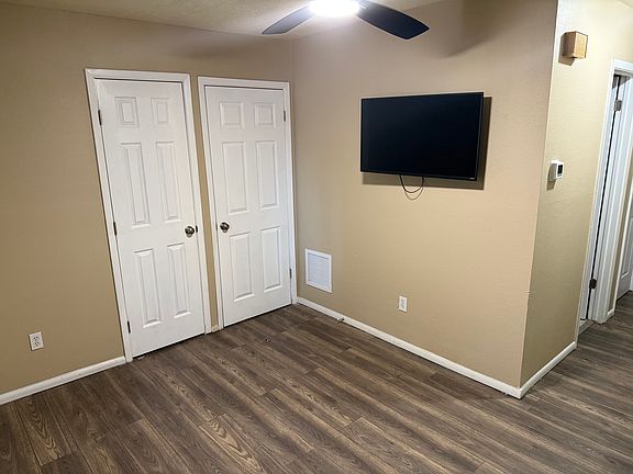 Living area. closet on the right, water heater on the left.