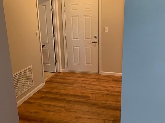 Backside of front door. Notice the new floors!